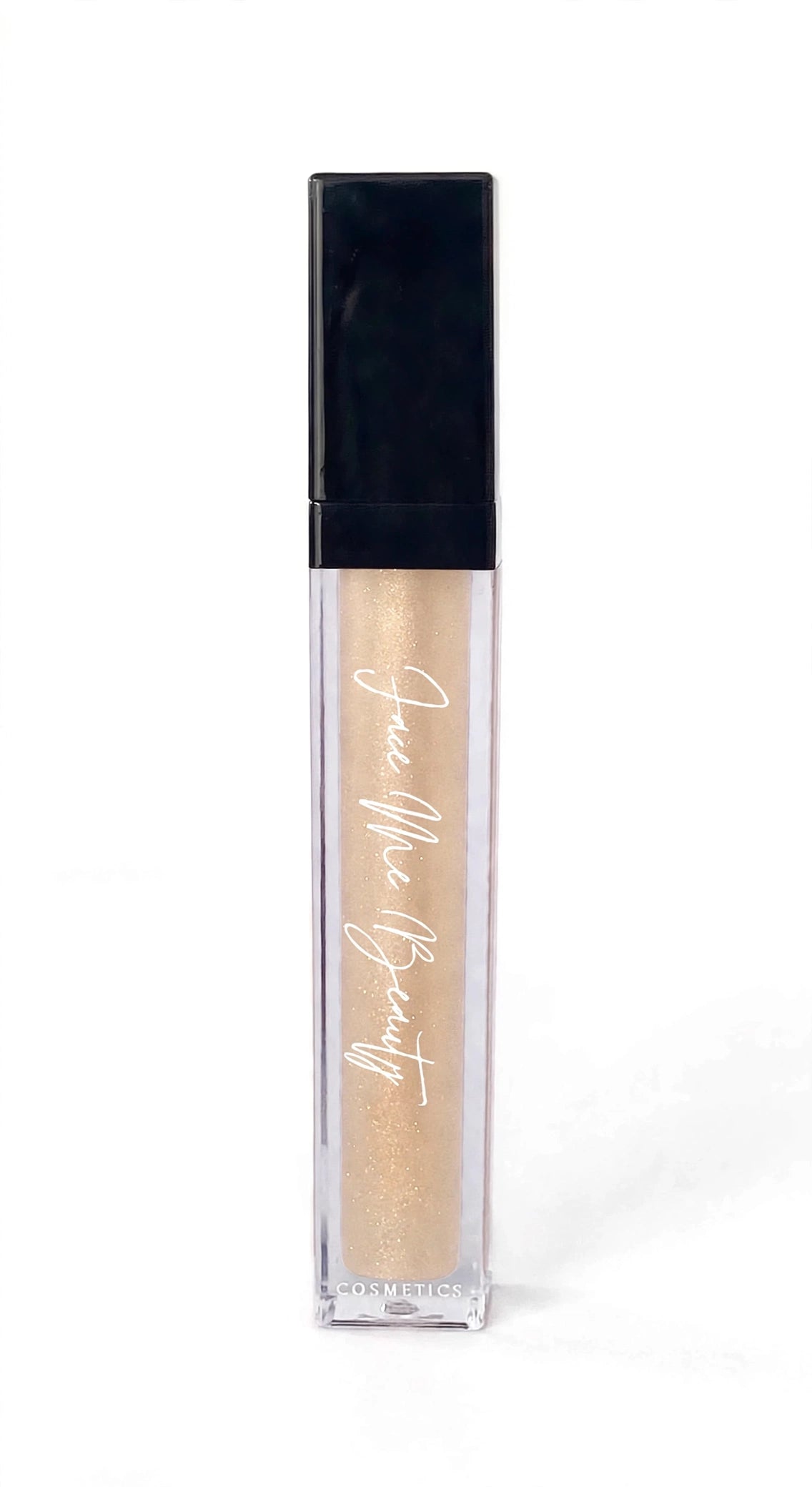 A clear rectangular tube of concealer with a black cap, showing a shimmering champagne-beige formula inside. The tube has 'Face Me Beauty' printed in white script on the front, set against a plain white background.