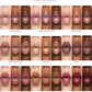 A lip color shade chart titled 'FACE ME BEAUTY' showing 24 glossy lip swatches arranged in a 3x8 grid. Each row features different shade names including Unbothered, Diamond Princess, Pretty Girl, Main Character, Top Tier, Suga, Candy, Creamae, and Mocha.